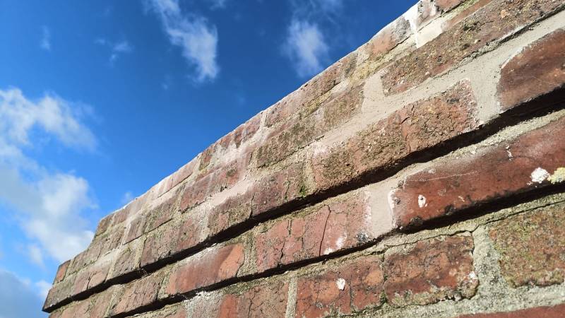 Entreprise pour la réparation d'une cheminée en briques sur Fécamp 76