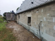 Rénovation d'une façade en colombage sur Fécamp 76 par notre équipe de maçons